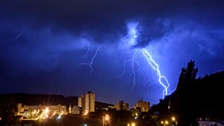 Lightning bolts illuminate the sky during a morning storm over Salgotarjan, 1 September. 2020