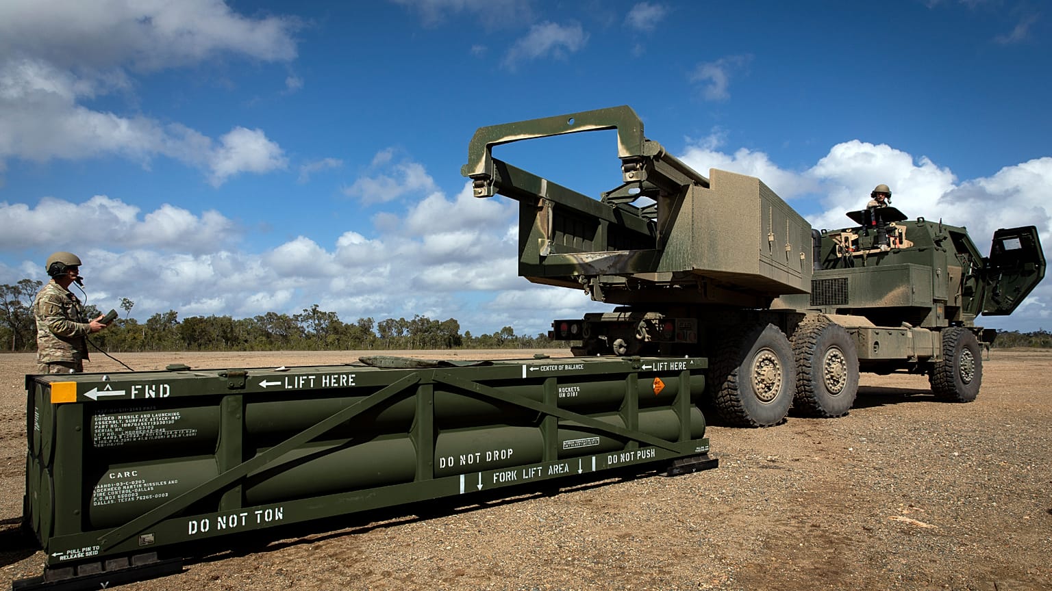 FILE: A US soldier prepares the crane for loading the Army Tactical Missile System (ATACMS) onto the High Mobility Artillery Rocket System (HIMARS) in Queensland, 26 July 2023