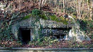 FILE - A World War II bunker is embedded into a hillside above the River Meuse in Lanaye, Belgium on 14 December 2015.