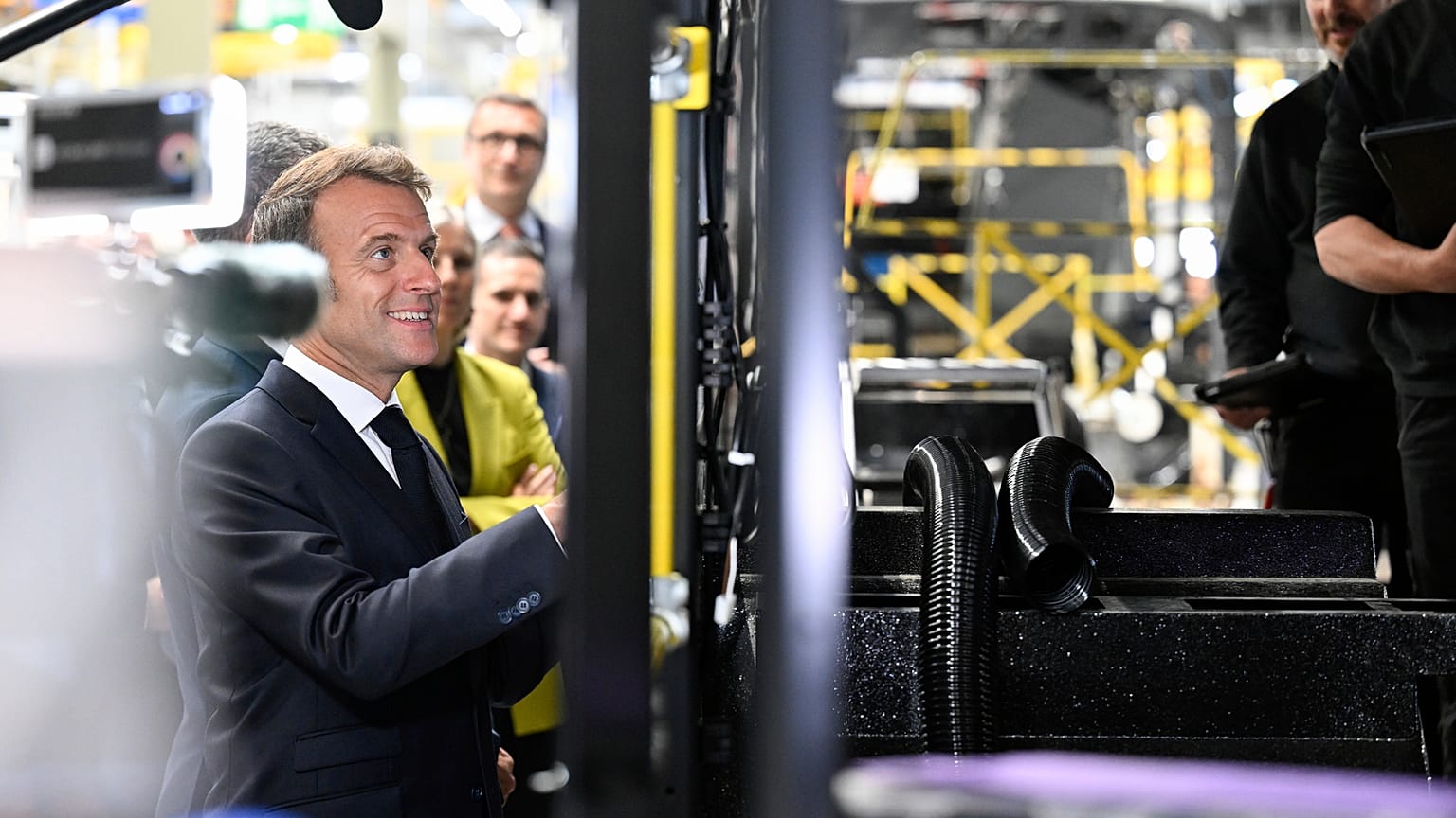 French President Emmanuel Macron visits the Daimler Buses factory as part of the 8th Choose France summit aimed at attracting foreign investments in France