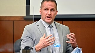 FILE - Former Louisville Police Officer Brett Hankison is questioned by his defense attorney, March 2, 2022, in Louisville, Ky. 