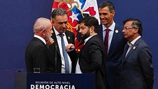 Latin American leaders and Spain's Prime Minister Pedro Sanchez talk during a forum on democracy and multilateralism at La Moneda palace in Santiago, 21 July 2025