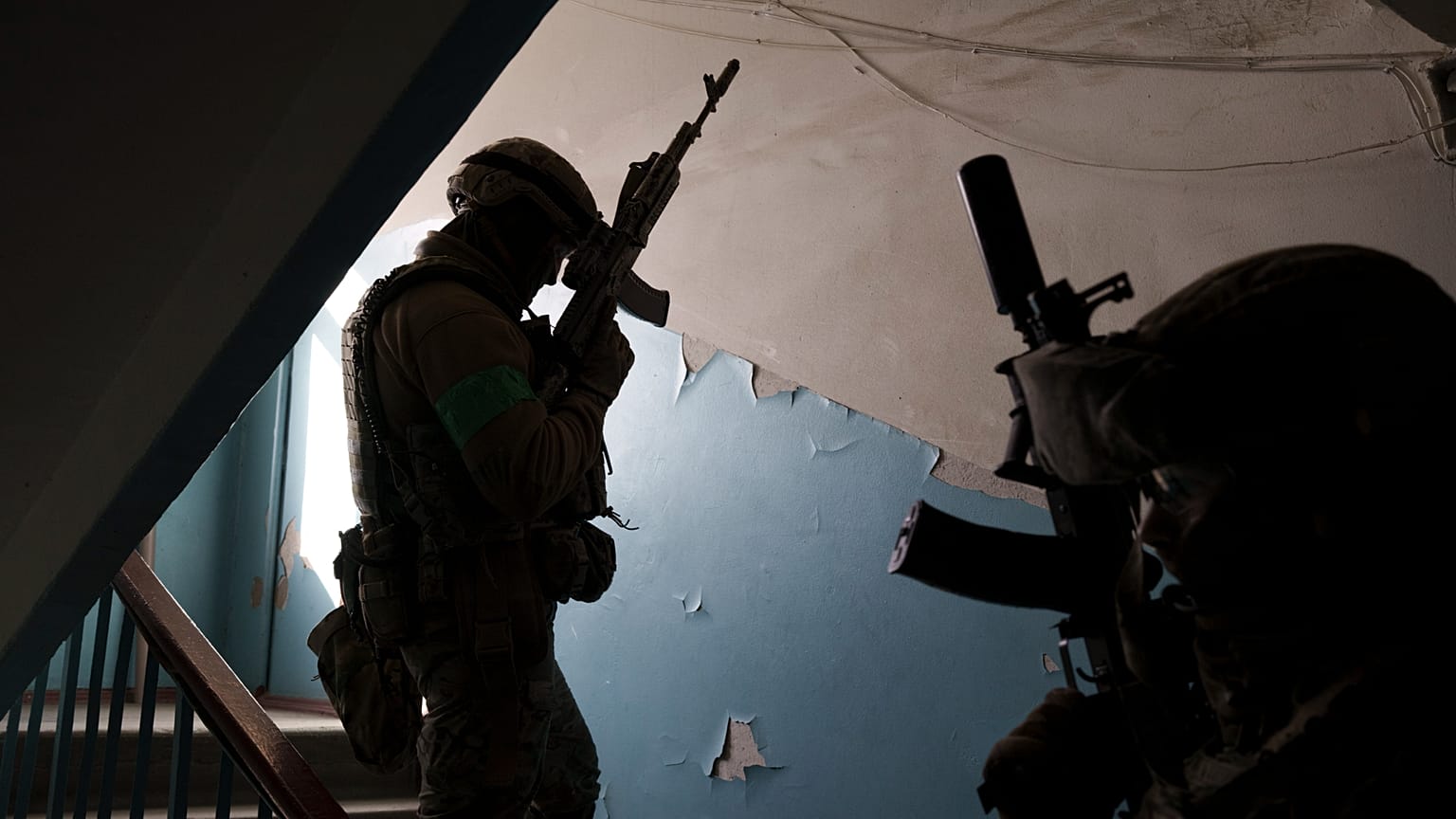 FILE: Security Service of Ukraine (SBU) servicemen enter a building during an operation to arrest suspected Russian collaborators in Kharkiv, 14 April 2022