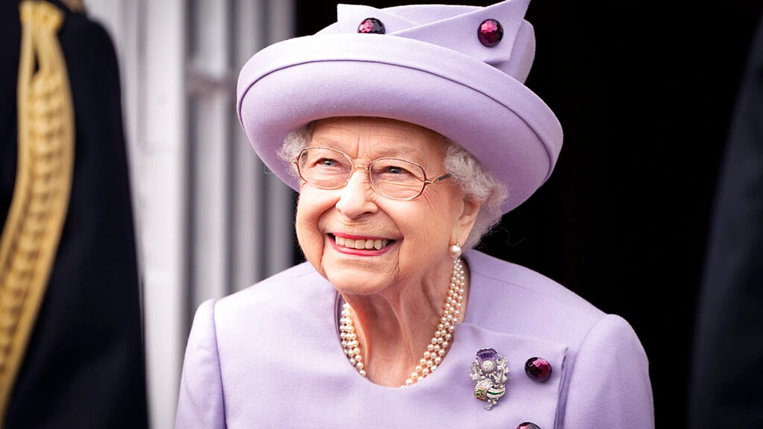 Queen Elizabeth II attends an armed forces act of loyalty parade in June 2022, shortly before her death.