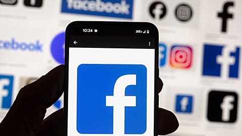 he Facebook logo is seen on a cell phone in Boston, USA, Oct. 14, 2022.