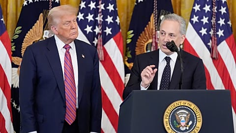White House AI and crypto czar David Sacks speaks as President Donald Trump listens at an event for the signing of the GENIUS Act. 