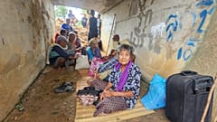 Os tailandeses que fugiram dos confrontos entre soldados tailandeses e cambojanos abrigam-se em Surin
