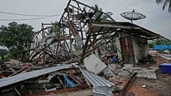 A house is seen damaged after Cambodia fired artillery shells in Surin Province, Thailand, Sunday, July 27, 2025. 
