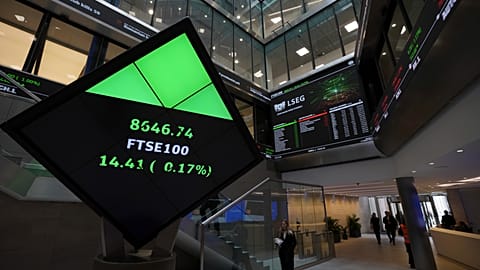 FTSE market information is displayed inside the London Stock Exchange, in the City of London. 17 March 2025.