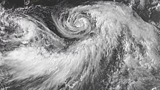This satellite image provided by the National Oceanic and Atmospheric Administration (NOAA) shows Hurricane Iona forming in the central Pacific Ocean, 28 July, 2025