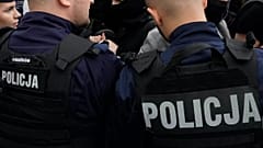 Police officers try to break up group of demonstrators in Warsaw, 19 July, 2025