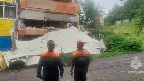 Rescuers inspect a kindergarten damaged by an earthquake in Petropavlovsk-Kamchatsky, Russia, Wednesday, July 30, 2025.
