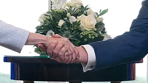 President Donald Trump and European Commission President Ursula von der Leyen shake hands after reaching a trade deal at Trump's Turnberry golf course in Turnberry, Scotland.
