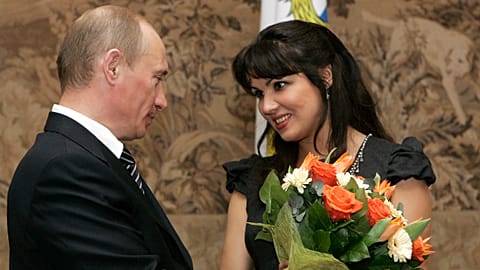 Vladimir Putin congratulates Russian opera diva Anna Netrebko on awarding her a state honor, the People's Artist of Russia - 2008