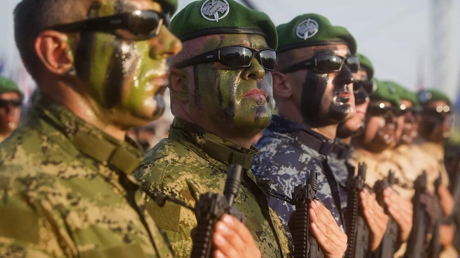 Croatian Army special forces troops march during a military parade marking the 20th anniversary of the "Operation Storm" that crushed Serb insurgency in Croatia, in Zagreb, Tu