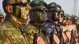 Croatian Army special forces troops march during a military parade marking the 20th anniversary of the "Operation Storm" that crushed Serb insurgency in Croatia, in Zagreb, Tu