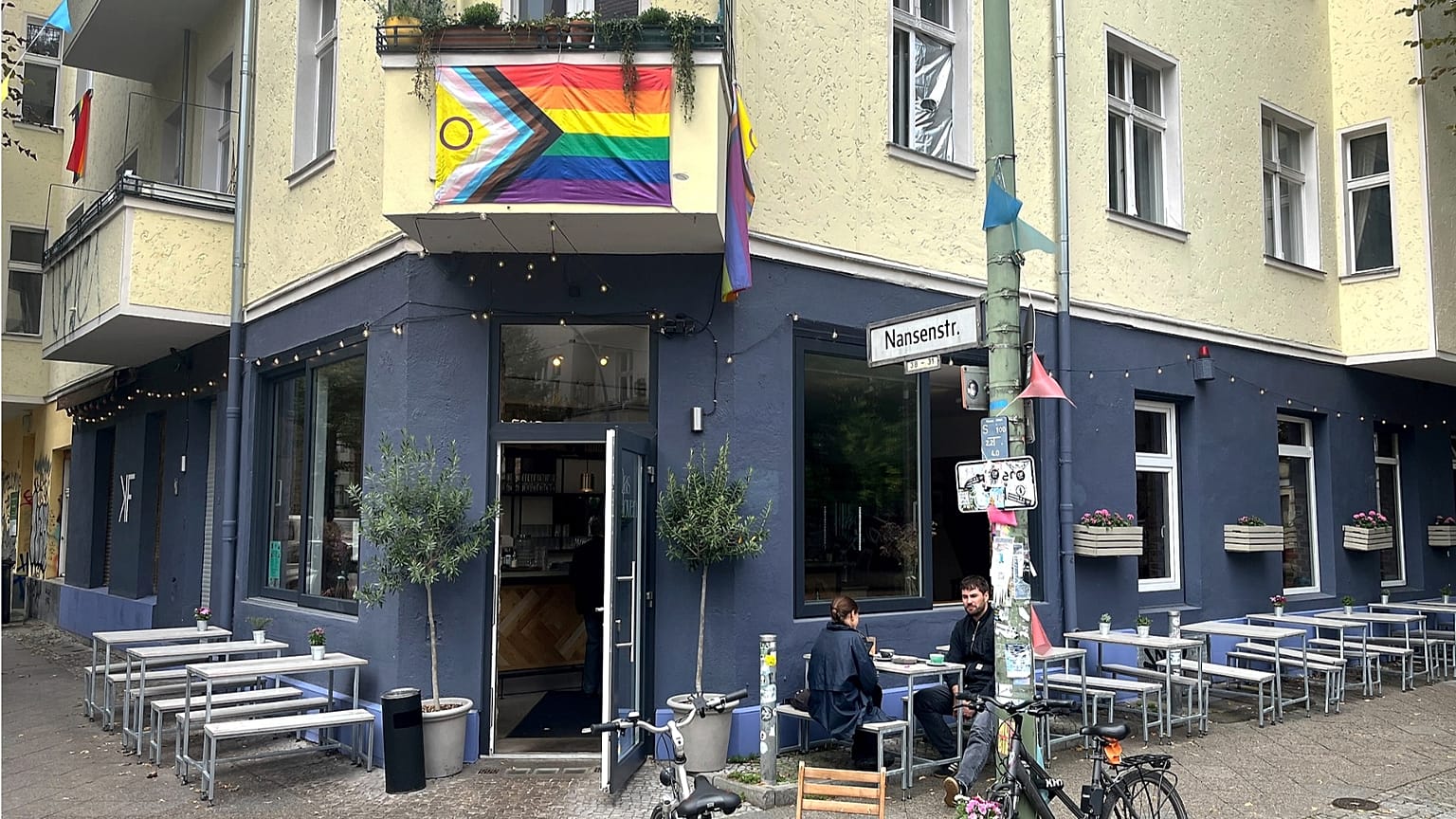 How an LGBTQ+ cafe's neon sign became a beacon for hate in Berlin