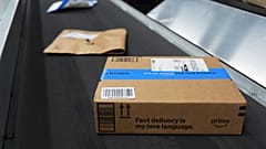 Packages move along a conveyer system at an Amazon Pharmacy fulfillment centre. 29 July 2025. Michigan.