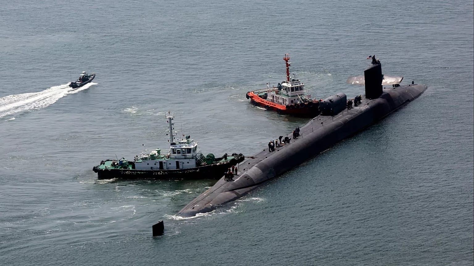 The nuclear-powered submarine USS Michigan approaches a naval base in Busan, 16 June, 2023