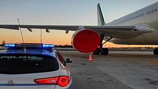 Policía en el aeropuerto de Malpensa