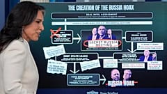 FILE: Director of National Intelligence Tulsi Gabbard walks to the podium to speak with reporters in the James Brady Press Briefing Room at the White House, 23 July 2025