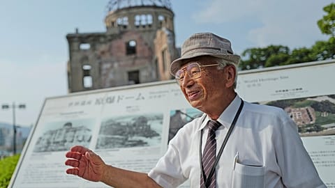 Kunihiko Iida, an atomic bomb survivor and volunteer guide for the iconic exhibition hall best known as the Atomic Bomb Dome.