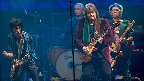 Mick Taylor, formerly of British band the Rolling Stones performs on the Pyramid main stage at Glastonbury in 2013.