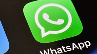 The WhatsApp application is shown.