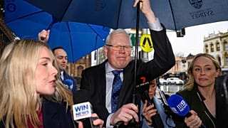 FILE: Gareth Ward walks through waiting media as he arrives at the Darlinghurst Courthouse in Sydney, 30 July 2025