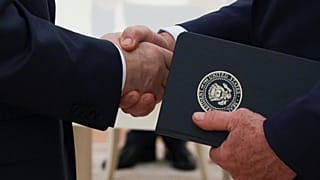 FILE: Russian President Vladimir Putin and US special envoy Steve Witkoff shake hands during their meeting at the Kremlin in Moscow, 6 August 2025