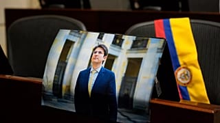 A photo of opposition Senator Miguel Uribe is placed at his seat in Congress in Bogotá, 11 August, 2025