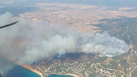 Aerial view of the fire threatening the town of Tarifa ('Cádiz), 11 August 2025.