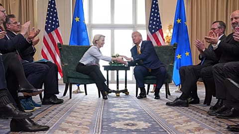 President Donald Trump and European Commission President Ursula von der Leyen shake hands after reaching a trade deal at the Trump Turnberry golf course in Turnberry, Scotland