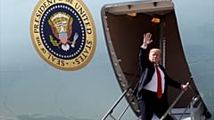FILE: President Donald Trump waves after greeting troops at Joint Base Elmendorf-Richardson in Anchorage, 24 May 2019