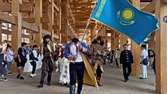The celebrations opened with a parade led by strongman and four-time world record-holder Sergey Tsyrulnikov carrying the national flag, joined by Kazakh warriors (batyrs) 
