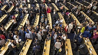 Delegates react at plastics treaty talks in Geneva on Thursday. 