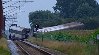 Emergency services attend the passengers involved in a train derailment at the village of Bjerndrup, 15 August, 2025