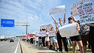 Air Canada flight attendants strike outside Montreal–Trudeau International Airport in Montreal, Saturday, Aug. 16, 2025.