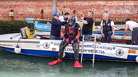 Watch: The gondoliers dive deep to reclaim Venice’s beauty 
