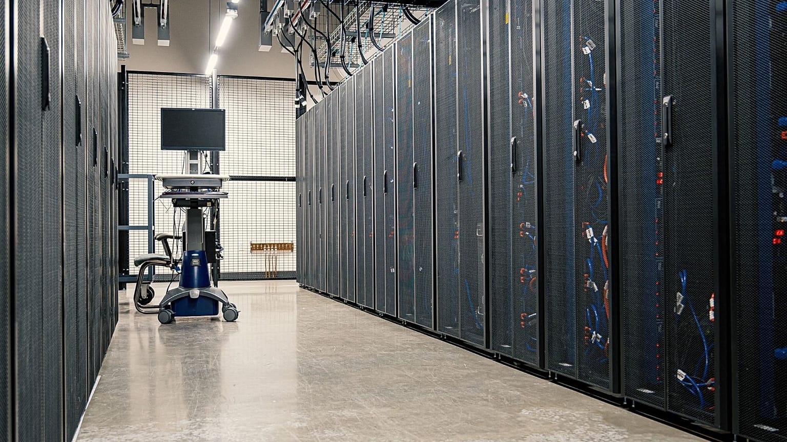 The inside of a data centre is shown.