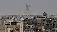 Smoke rises to the sky following an Israeli military strike in Khan Younis, in the Gaza Strip, Thursday, Aug. 21, 2025.