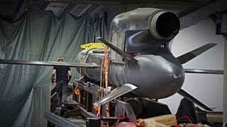 Workers inspect Flamingo missiles at a secret Fire Point factory in Ukraine, 14 August 2025