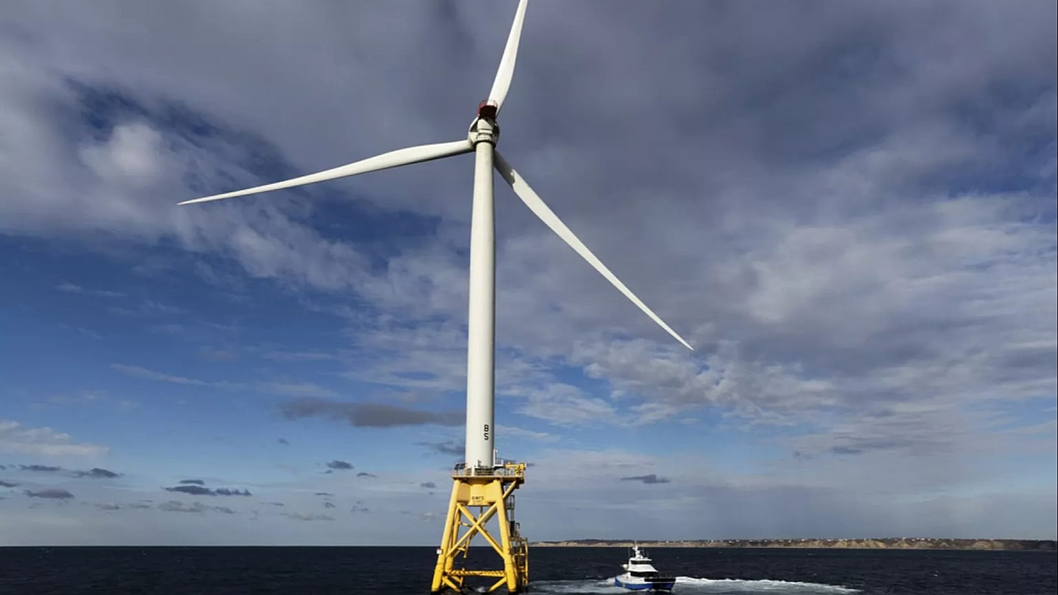 A Block Island Wind Farm turbine operates, Dec. 7, 2023, off the coast of Block Island, R.I., during a tour organized by Orsted.