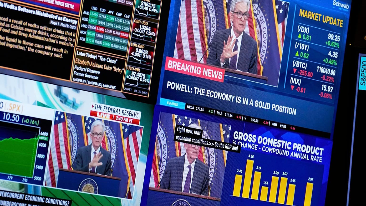FILE: Televisions display Fed chairman Jerome Powell speaking on the floor at the New York Stock Exchange in New York, 30 July 2025