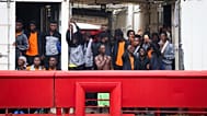 A view of migrants on board the Ocean Viking ship arriving at Naples port pier 21, in Naples, Italy, Monday, Aug. 28, 2023
