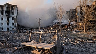 Smoke rises over a residential building destroyed by a Russian air strike on Kramatorsk, 31 July, 2025