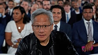 Nvidia CEO Jensen Huang arrives before President Donald Trump speaks during an AI summit at the Andrew W. Mellon Auditorium, Wednesday, July 23, 2025, in Washington.