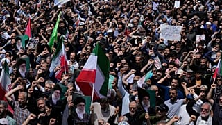 هواداران حکومت ایران در یک راهپیمایی در این کشور