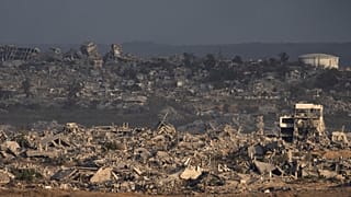 Buildings that were destroyed during the Israeli ground and air operations stand in the Gaza Strip as seen from southern Israel, Thursday, Aug. 28, 2025.