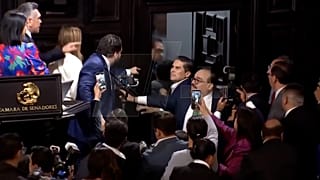 SCREENSHOT - Tempers flare in Mexico senate as disagreeing politicians push and shove each other